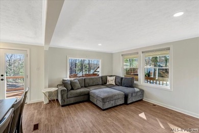 A renovated ranch on the shores of Poplar Creek. Privacy awaits on Tanglewood Shores Golf Club in Virginia - for sale on GolfHomes.com, golf home, golf lot