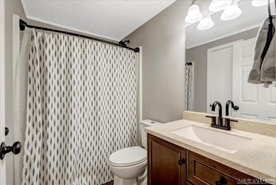 A renovated ranch on the shores of Poplar Creek. Privacy awaits on Tanglewood Shores Golf Club in Virginia - for sale on GolfHomes.com, golf home, golf lot