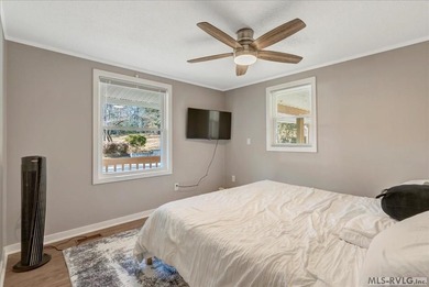 A renovated ranch on the shores of Poplar Creek. Privacy awaits on Tanglewood Shores Golf Club in Virginia - for sale on GolfHomes.com, golf home, golf lot