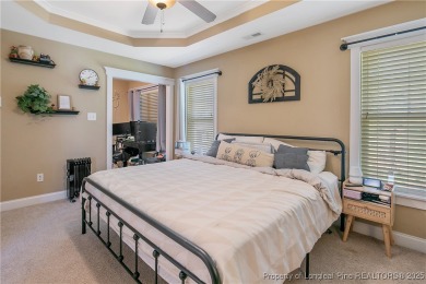 Welcome to this exceptional Craftsman-style 4-bedroom on Anderson Creek Golf Club in North Carolina - for sale on GolfHomes.com, golf home, golf lot