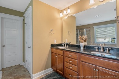 Welcome to this exceptional Craftsman-style 4-bedroom on Anderson Creek Golf Club in North Carolina - for sale on GolfHomes.com, golf home, golf lot
