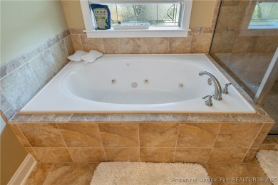 Welcome to this exceptional Craftsman-style 4-bedroom on Anderson Creek Golf Club in North Carolina - for sale on GolfHomes.com, golf home, golf lot