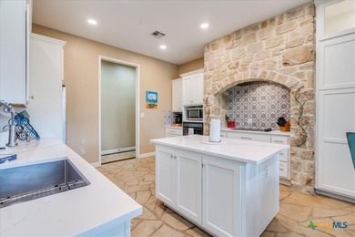 Welcome home to 302 Guadalupe River Drive, a custom waterfront on Golf Club of Seguin in Texas - for sale on GolfHomes.com, golf home, golf lot