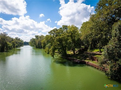 Welcome home to 302 Guadalupe River Drive, a custom waterfront on Golf Club of Seguin in Texas - for sale on GolfHomes.com, golf home, golf lot