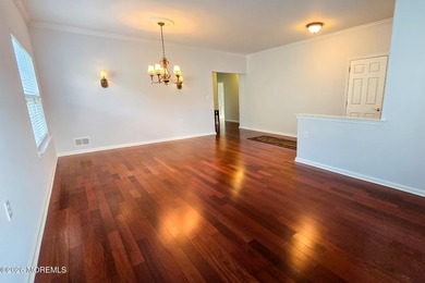 Extended Aragon model with four-season sunroom and front porch on Renaissance Country Club in New Jersey - for sale on GolfHomes.com, golf home, golf lot