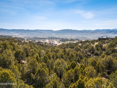 Tucked quietly among mature juniper trees, this 1.25-acre on Red Ledges Golf Club in Utah - for sale on GolfHomes.com, golf home, golf lot