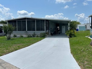 LOVELY DOUBLE-WIDE!  LARGE FRONT LANAI!  TURNKEY! FURNISHED on Wedgewood Golf Club in Florida - for sale on GolfHomes.com, golf home, golf lot