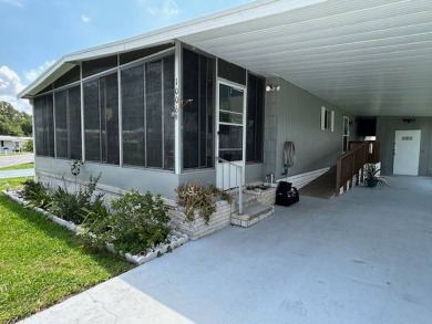LOVELY DOUBLE-WIDE!  LARGE FRONT LANAI!  TURNKEY! FURNISHED on Wedgewood Golf Club in Florida - for sale on GolfHomes.com, golf home, golf lot