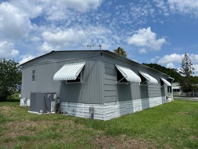 LOVELY DOUBLE-WIDE!  LARGE FRONT LANAI!  TURNKEY! FURNISHED on Wedgewood Golf Club in Florida - for sale on GolfHomes.com, golf home, golf lot