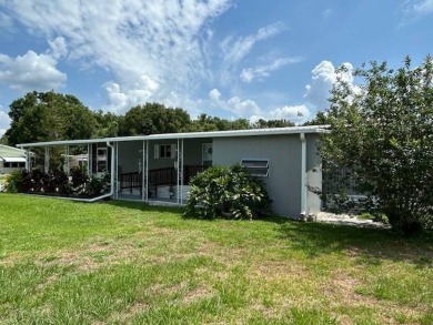 LOVELY DOUBLE-WIDE!  LARGE FRONT LANAI!  TURNKEY! FURNISHED on Wedgewood Golf Club in Florida - for sale on GolfHomes.com, golf home, golf lot