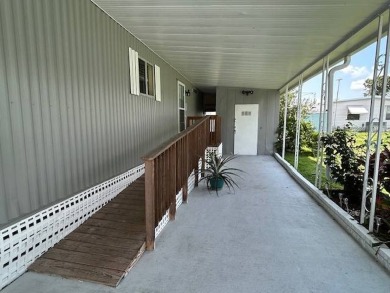 LOVELY DOUBLE-WIDE!  LARGE FRONT LANAI!  TURNKEY! FURNISHED on Wedgewood Golf Club in Florida - for sale on GolfHomes.com, golf home, golf lot