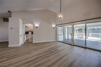 Located in the heart of The Forest, this well-maintained on The Forest Country Club in Florida - for sale on GolfHomes.com, golf home, golf lot