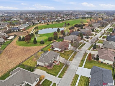 Come tour this amazing home on NuMark Golf Course. This on Pine Lake Golf and Tennis Club in Nebraska - for sale on GolfHomes.com, golf home, golf lot