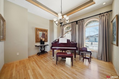 Come tour this amazing home on NuMark Golf Course. This on Pine Lake Golf and Tennis Club in Nebraska - for sale on GolfHomes.com, golf home, golf lot