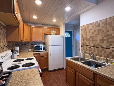 Turn-key, fully furnished, and was already performing as an on Mountain Ranch Golf Club in Arkansas - for sale on GolfHomes.com, golf home, golf lot