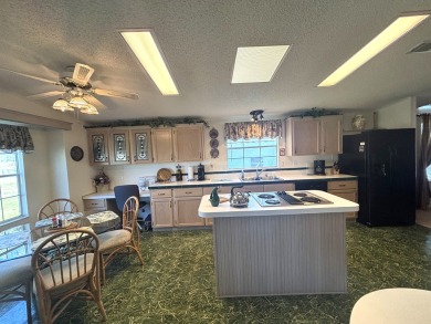 ***This home is located within a 55+ resort style leased land on Big Cypress Golf and Country Club in Florida - for sale on GolfHomes.com, golf home, golf lot