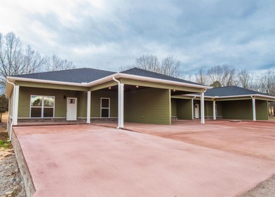 Luxury condominium located on Cooper's Hawk Golf Course on Coopers Hawk in Arkansas - for sale on GolfHomes.com, golf home, golf lot