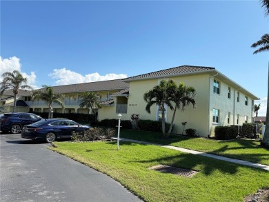 Impressive second floor light and bright END UNIT offers views on Saint Andrews South Golf Club in Florida - for sale on GolfHomes.com, golf home, golf lot