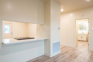 Luxury condominium located on Cooper's Hawk Golf Course on Coopers Hawk in Arkansas - for sale on GolfHomes.com, golf home, golf lot