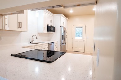 Luxury condominium located on Cooper's Hawk Golf Course on Coopers Hawk in Arkansas - for sale on GolfHomes.com, golf home, golf lot