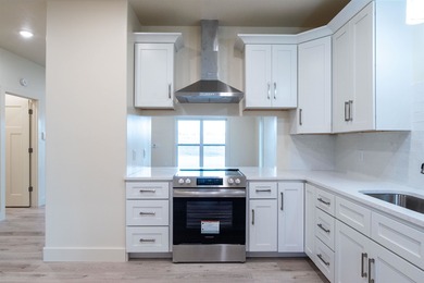 Luxury condominium located on Cooper's Hawk Golf Course on Coopers Hawk in Arkansas - for sale on GolfHomes.com, golf home, golf lot