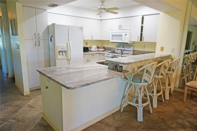 Impressive second floor light and bright END UNIT offers views on Saint Andrews South Golf Club in Florida - for sale on GolfHomes.com, golf home, golf lot