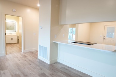 Luxury condominium located on Cooper's Hawk Golf Course on Coopers Hawk in Arkansas - for sale on GolfHomes.com, golf home, golf lot