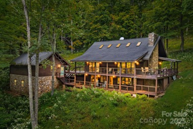 Secluded mountain cabin on three lots totaling 2.74 acres with on Wolf Laurel Country Club in North Carolina - for sale on GolfHomes.com, golf home, golf lot