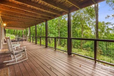 Secluded mountain cabin on three lots totaling 2.74 acres with on Wolf Laurel Country Club in North Carolina - for sale on GolfHomes.com, golf home, golf lot