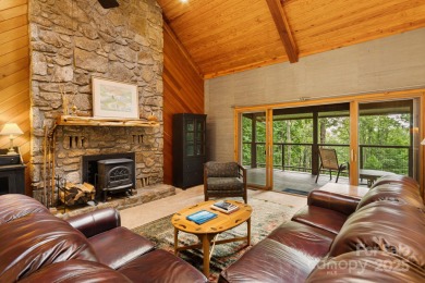 Secluded mountain cabin on three lots totaling 2.74 acres with on Wolf Laurel Country Club in North Carolina - for sale on GolfHomes.com, golf home, golf lot