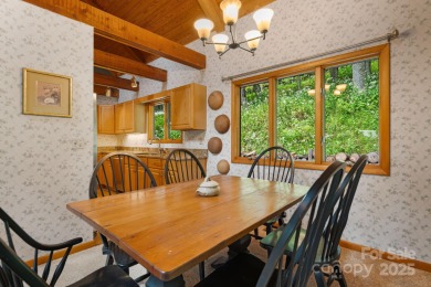 Secluded mountain cabin on three lots totaling 2.74 acres with on Wolf Laurel Country Club in North Carolina - for sale on GolfHomes.com, golf home, golf lot