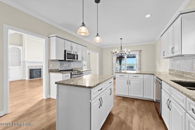 Imagine waking up, coffee in hand on your covered back deck on Eagle Creek Golf Course in Kentucky - for sale on GolfHomes.com, golf home, golf lot