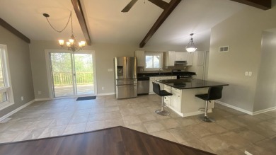 Welcome home to this Beautiful updated 4 bedroom, 2 bath home on Lakes of the Four Seasons Country Club in Indiana - for sale on GolfHomes.com, golf home, golf lot