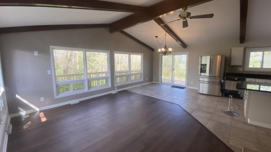 Welcome home to this Beautiful updated 4 bedroom, 2 bath home on Lakes of the Four Seasons Country Club in Indiana - for sale on GolfHomes.com, golf home, golf lot