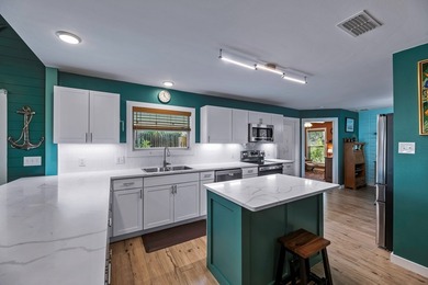 Beautifully updated and ideally located, this Harbor Oaks home on Rockport Country Club in Texas - for sale on GolfHomes.com, golf home, golf lot