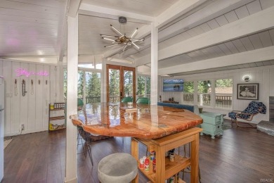 Treehouse vibes and Moonridge magic--this cabin places you at on Big Bear Mountain Ski and Golf Resort in California - for sale on GolfHomes.com, golf home, golf lot