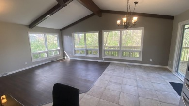 Welcome home to this Beautiful updated 4 bedroom, 2 bath home on Lakes of the Four Seasons Country Club in Indiana - for sale on GolfHomes.com, golf home, golf lot