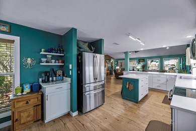 Beautifully updated and ideally located, this Harbor Oaks home on Rockport Country Club in Texas - for sale on GolfHomes.com, golf home, golf lot