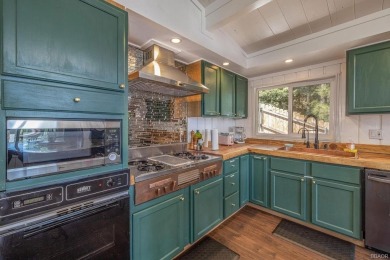 Treehouse vibes and Moonridge magic--this cabin places you at on Big Bear Mountain Ski and Golf Resort in California - for sale on GolfHomes.com, golf home, golf lot