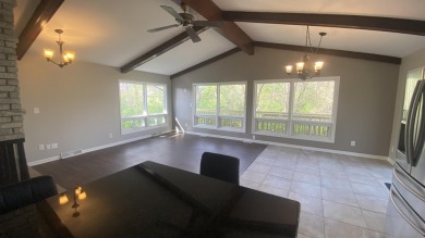Welcome home to this Beautiful updated 4 bedroom, 2 bath home on Lakes of the Four Seasons Country Club in Indiana - for sale on GolfHomes.com, golf home, golf lot