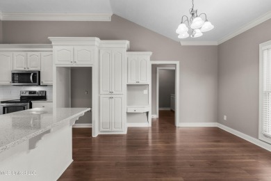 Welcome to this fantastic home on a spacious corner lot, just on Lake Caroline Golf Club in Mississippi - for sale on GolfHomes.com, golf home, golf lot