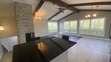 Welcome home to this Beautiful updated 4 bedroom, 2 bath home on Lakes of the Four Seasons Country Club in Indiana - for sale on GolfHomes.com, golf home, golf lot