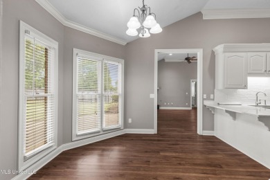 Welcome to this fantastic home on a spacious corner lot, just on Lake Caroline Golf Club in Mississippi - for sale on GolfHomes.com, golf home, golf lot