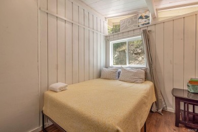 Treehouse vibes and Moonridge magic--this cabin places you at on Big Bear Mountain Ski and Golf Resort in California - for sale on GolfHomes.com, golf home, golf lot