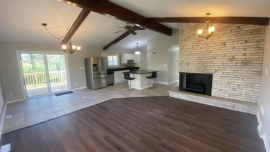 Welcome home to this Beautiful updated 4 bedroom, 2 bath home on Lakes of the Four Seasons Country Club in Indiana - for sale on GolfHomes.com, golf home, golf lot