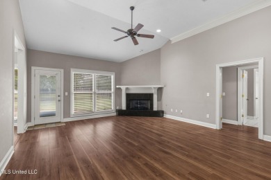 Welcome to this fantastic home on a spacious corner lot, just on Lake Caroline Golf Club in Mississippi - for sale on GolfHomes.com, golf home, golf lot