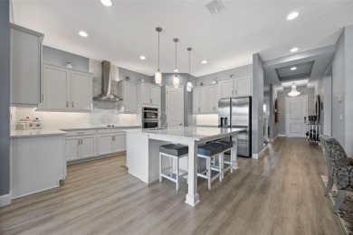 Under contract-accepting backup offers. LUXURY HOME ON A PREMIUM on Eagle Creek Golf Club in Florida - for sale on GolfHomes.com, golf home, golf lot