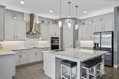 Under contract-accepting backup offers. LUXURY HOME ON A PREMIUM on Eagle Creek Golf Club in Florida - for sale on GolfHomes.com, golf home, golf lot