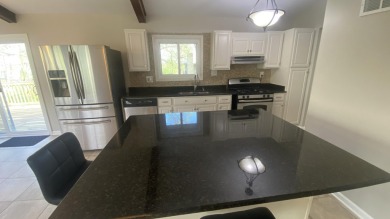 Welcome home to this Beautiful updated 4 bedroom, 2 bath home on Lakes of the Four Seasons Country Club in Indiana - for sale on GolfHomes.com, golf home, golf lot
