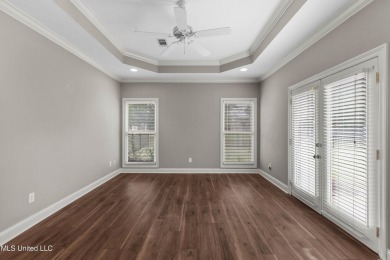 Welcome to this fantastic home on a spacious corner lot, just on Lake Caroline Golf Club in Mississippi - for sale on GolfHomes.com, golf home, golf lot